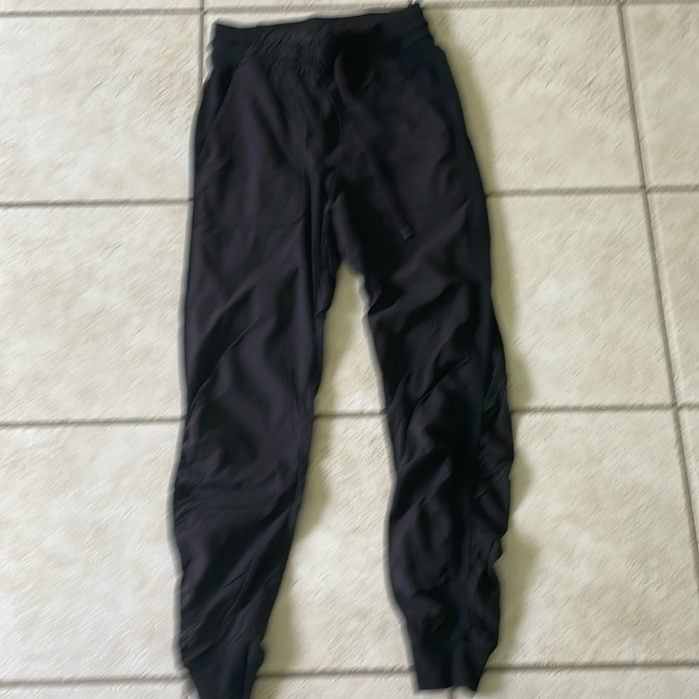 EUC Lululemon woman’s Black Dance Studio Mid Rise Joggers. Size 4.